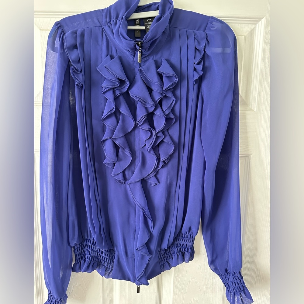 Purple ruffled blouse